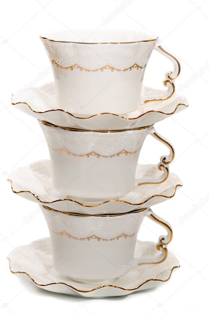 Porcelain tea cups stack on each other
