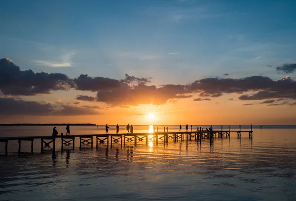 People Wooden Pier Beautiful Sunset Sea — стокове фото