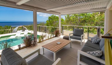 beautiful luxury villa with swimming pool and wooden floor