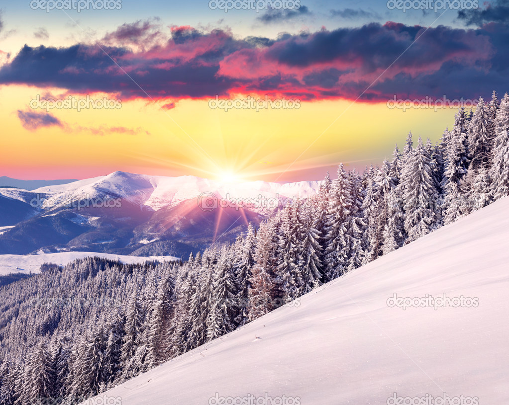 Winter sunrise in mountains