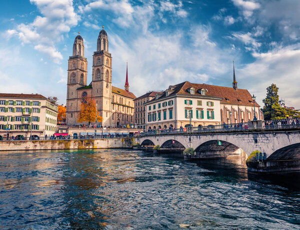 Charm of the ancient cities of Europe. Splendid autumn cityscape of Zurich city, Switzerland, Europe. Wonderful morning scene of Grossmunste - Protestant church.
