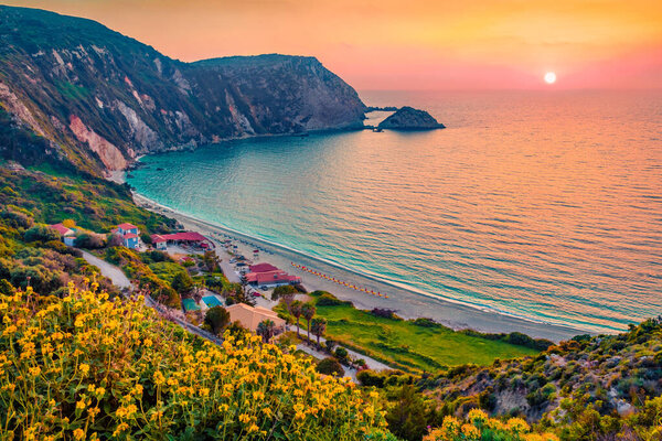 Charming summer view of Petani Beach. Incredible sunset on Cephalonia Island, Greece, Europe. Exciting evening seascape of Mediterranen Sea. Fantastic outdoor scene of Ionian Islands.