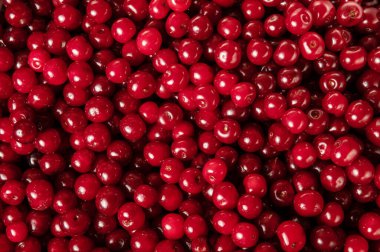 Taze kirazlı yakın plan. Kiraz arka planı. Tatlı organik kirazlar. Kırmızı kiraz arkaplanı.