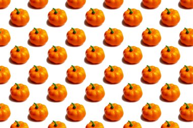Pumpkin pattern for Halloween. Trendy festive pumpkin pattern on a white background. View from above