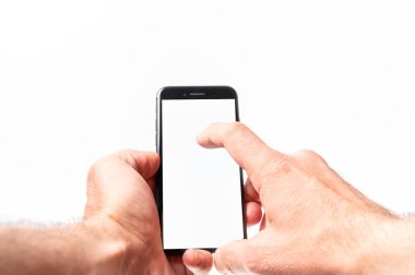 Man hand using smartphone on white background. Closeup shot of man hand holding a smartphone. Horozontal image