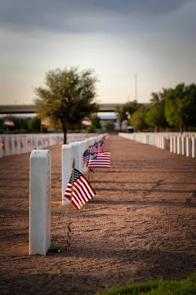 The night before Memorial Day, with all the flags in place, at a west Texas national cemetery.