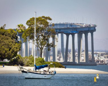 A sailboat sits moored at Glorietta Bay in Coronado, California near San Diego.