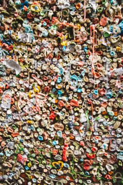 A close-up view of the famous downtown Seattle gum wall.