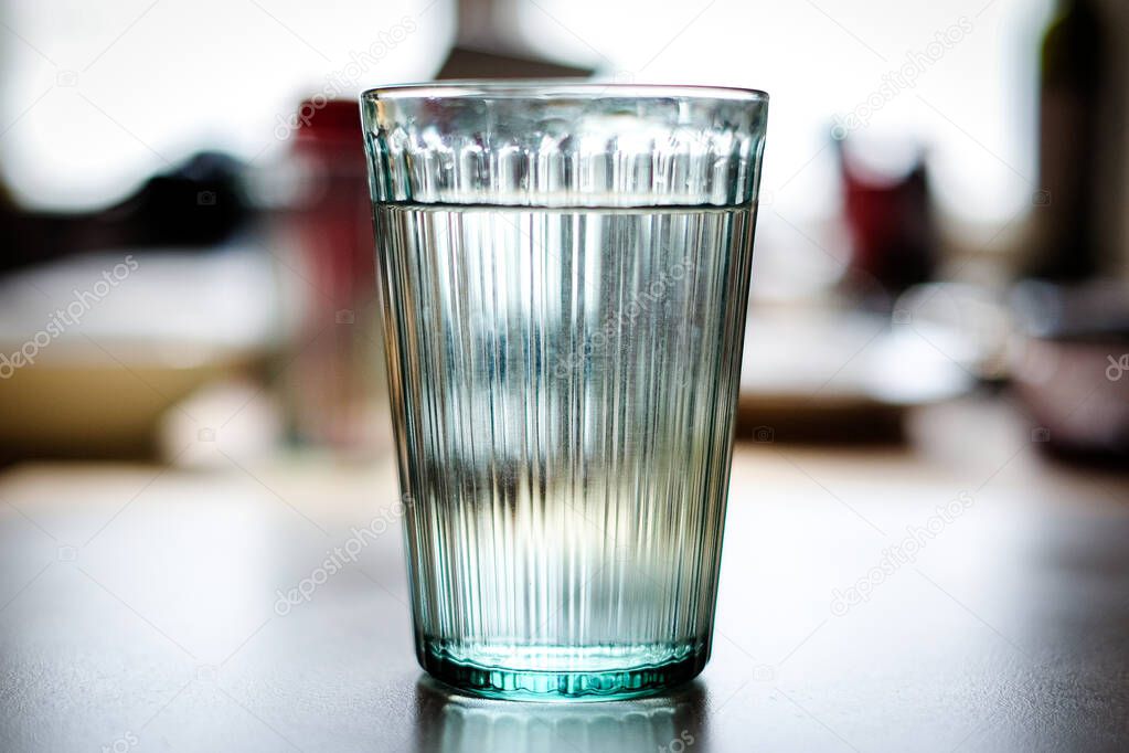 Glass of still water. Defocused