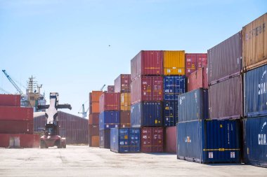 Riga, Latvia - April 20, 2022: Baltic Container Terminal in Freeport of Riga. Riga harbour, Latvia. Container ships in a port. Defocused