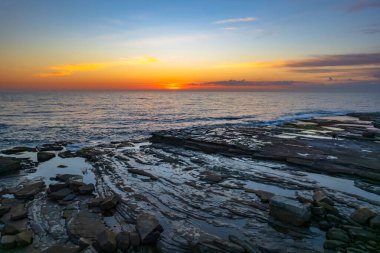 The Skillion at Terrigal in the Central Coast, NSW, Avustralya 'dan gün doğumu görüntüleri.