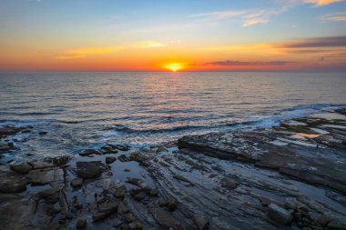 The Skillion at Terrigal in the Central Coast, NSW, Avustralya 'dan gün doğumu görüntüleri.