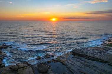 The Skillion at Terrigal in the Central Coast, NSW, Avustralya 'dan gün doğumu görüntüleri.