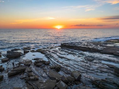The Skillion at Terrigal in the Central Coast, NSW, Avustralya 'dan gün doğumu görüntüleri.