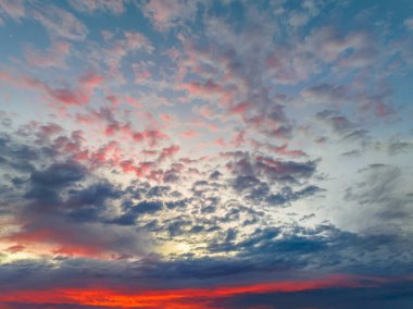 Aerial sunrise with medium and high cloud filled sky at  Macmasters Beach on the Central Coast, NSW, Australia.