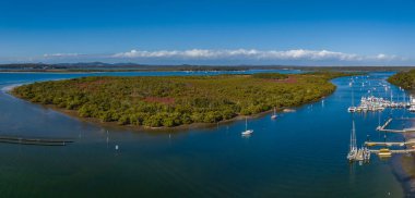Water views over Tilligerry Creek with boats at Lemon Tree Passage, Port Stephens, NSW, Australia.