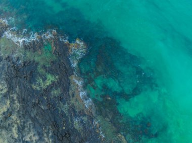 Avustralya, NSW 'nin güney kıyısındaki Broulee Sahili' nde gündoğumu deniz manzarası