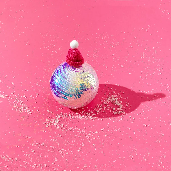 Big Shiny Christmas Ball Pink Pompom Cap Pink Background Snow — Stock Photo, Image