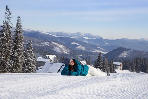 Woman Good Mood Lies Snow Background Landscape Snow Capped Mountains — Stock Fotó