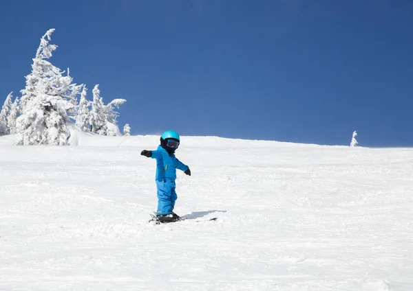 Toddler Boy Spreading His Arms Stands Skis Snow Covered Mountain — Stock Fotó