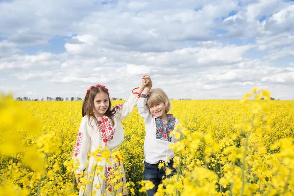 Boy Girl National Ukrainian Clothes Standing Blooming Yellow Rapeseed Field — Stock Photo, Image