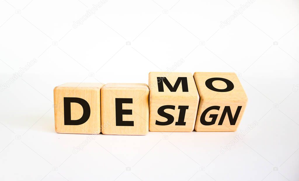 Demo and design symbol. Turned cubes and changed the word 'design' to 'demo'. Beautiful white background. Business demo and design concept. Copy space.