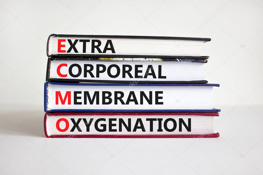 ECMO, Extra Corporeal Membrane Oxygenation symbol. Concept words 'ECMO, Extra Corporeal Membrane Oxygenation' on books on a beautiful white background. Copy space. Medical, ECMO concept.