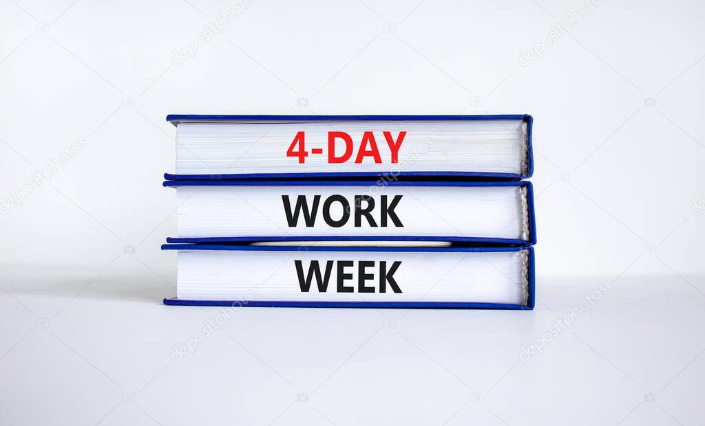 4-day work week symbol. Concept words '4-day work week' on books. Beautiful white background. Copy space. Business and 4-day work week concept.