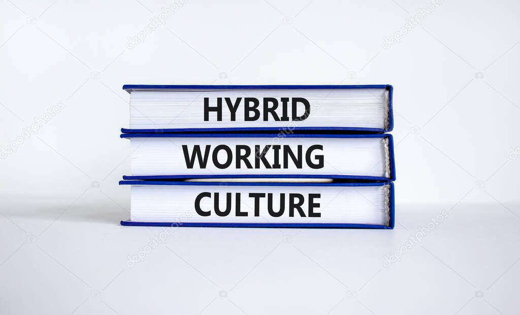 Hybrid working culture symbol. Concept words 'hybrid working culture' on books. Beautiful white background. Business and hybrid working culture concept, copy space.