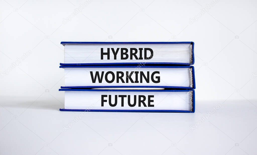 Hybrid working future symbol. Concept words 'hybrid working future'on books. Beautiful white background. Business and hybrid working future concept, copy space.