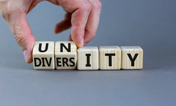 Diversity Unity Symbol Businessman Turns Wooden Cubes Changes Word Unity — Stock Photo, Image