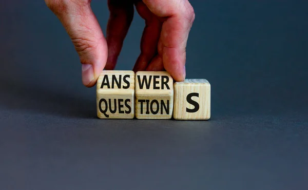 Questions Answers Symbol Businessman Turns Wooden Cubes Changes Word Questions — Stock Photo, Image