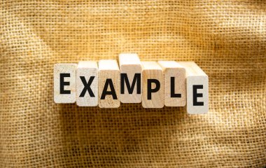 Örnek sembol. Ahşap bloklardaki konsept kelime. Güzel tuval arka plan, kopyalama alanı. İş ve örnek kavram.