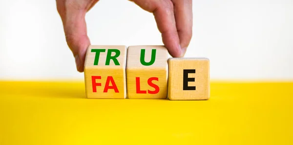 False True Symbol Businessman Turns Wooden Cubes Changes Word False — Stockfoto