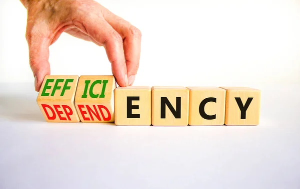 Efficiency Dependency Symbol Businessman Turns Cubes Changes Word Dependency Efficiency — Stock Photo, Image
