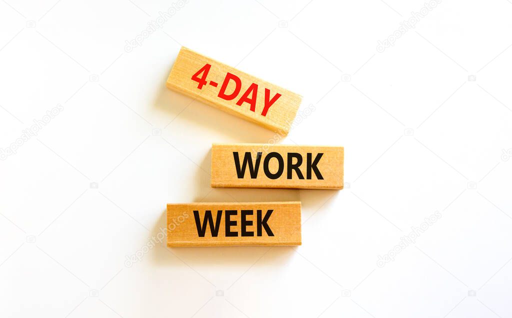 4-day work week symbol. Concept words 4-day work week on wooden blocks on beautiful white table, white background. Copy space. Business and 4-day work week and short workweek concept.