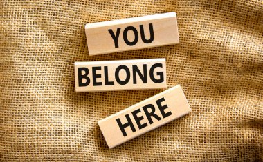 You belong here symbol. Concept words You belong here on beautiful canvas background. Diversity, business, inclusion and belonging concept. You belong here quote. clipart