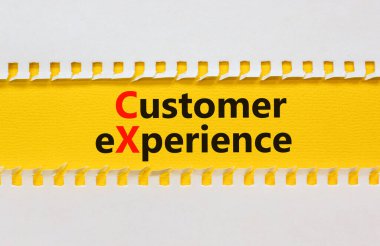 CX müşteri deneyimi sembolü. Sarı kağıt üzerinde sarı masa beyaz zemin üzerinde CX müşteri deneyimi kavramsal sözcükler, kopyalama alanı. İş ve CX müşteri deneyimi kavramı.