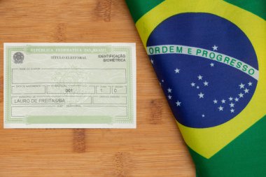 Brezilya seçmen kaydı Brezilya bayrağının yanında.