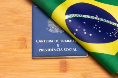 LAURO DE FREITAS, BRASIL - JULY 21, 2022 : Brazilian flag next brazilian work document