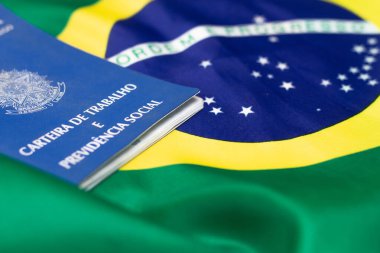 LAURO DE FREITAS, BRASIL - JULY 21, 2022 :Brazilian work document with Brazilian flag