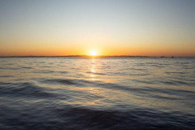 a beatiful sunset at the sea