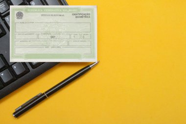 brazilian election document near keyboard