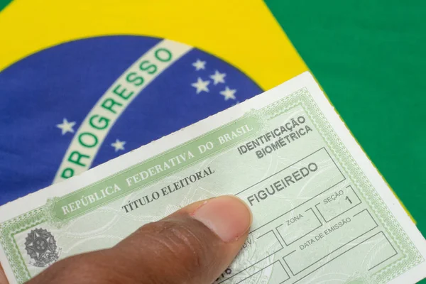 Hand Holding Brazilian Election Document Brazilian Flag — Fotografia de Stock