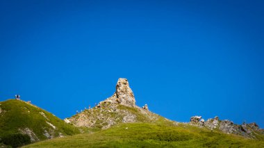 walk to the rocks at the Luenersee in Vorarlberg, Austria