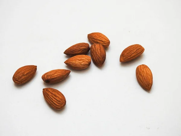 Pile Heap Many Almonds Seeds Isolated White Background — Fotografia de Stock