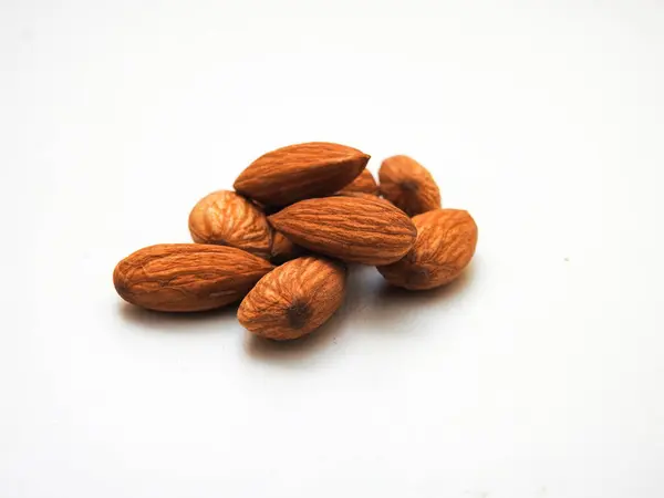 Pile Heap Many Almonds Seeds Isolated White Background — Stock Photo, Image