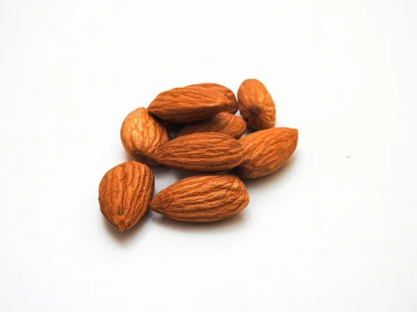 Pile Heap Many Almonds Seeds Isolated White Background — Fotografia de Stock