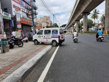 Bangalore, Karnataka, India-June 09, 2021: Closeup of mini ambulance vehicle parking on roadside during Corona Lock down