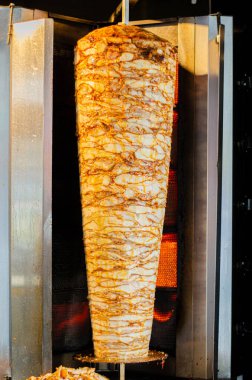 Meat on skewer for doner, traditional Turkish food